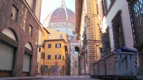 A-beautiful-cathedral-dome-looms-over-the-city-streets-of-Florence-Italy