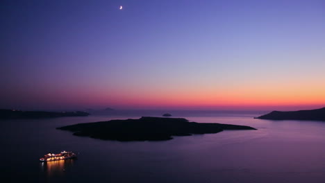 A-cruise-ship-moves-through-the-Greek-Isles-in-purple-light-at-dusk-1