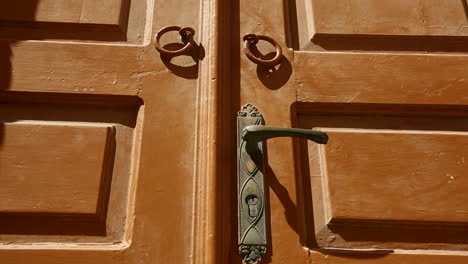 Close-detail-on-a-beautiful-wooden-door-in-a-Greek-village