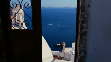 View-through-doors-on-the-island-of-Santorini-in-Greece