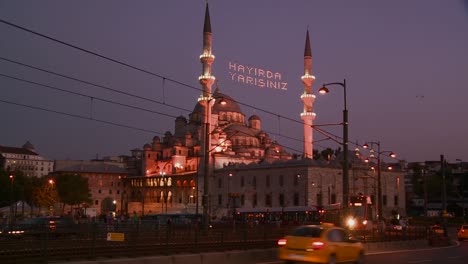 A-tram-passes-in-front-of-a-mosque-in-istanbul-Turkey-at-night