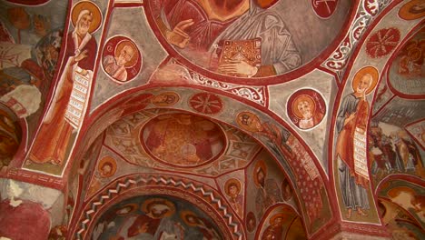 Low-angle-view-of-Christian-painted-ceilings-in-a-cave-near-Cappadocia-Turkey