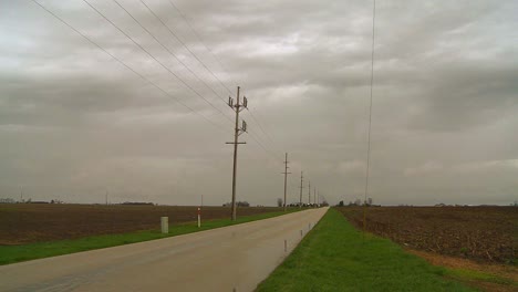 A-lonely-road-across-the-flatlands-in-the-midwest-of-the-U/S