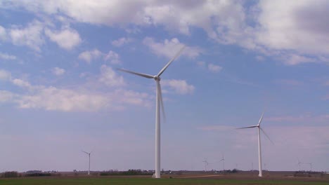 Giant-windmills-in-the-distance-generate-power-behind-farms-in-the-American-midwest-6