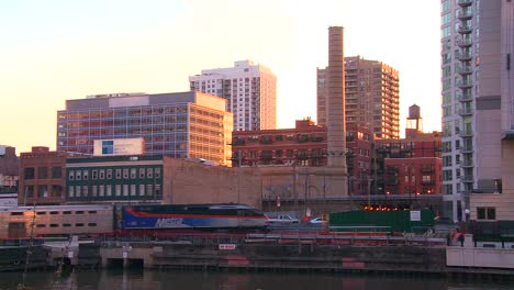 A-commuter-train-passes-in-front-of-the-Chicago-skyline