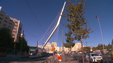 Traffic-moves-near-a-huge-bridge-in-the-form-of-a-harp-greets-visitors-in-the-new-city-of-Jerusalem-Israel