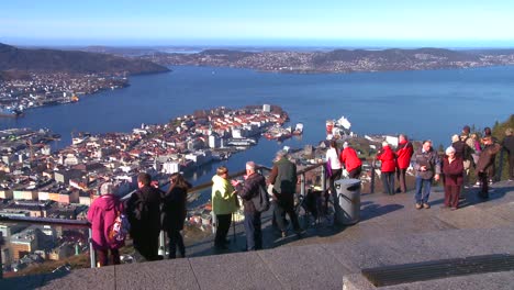 Tourists-gather-at-high-angle-overlook-of-Bergen-Norway