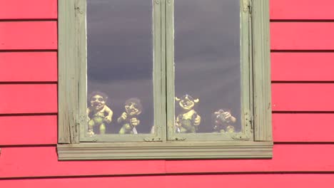 Small-troll-dolls-sit-in-a-window-in-Norway