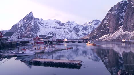 Snow-covers-a-beautiful-view-of-a-harbor--in-a-village-in-the-Arctic-Lofoten-Islands-Norway-1