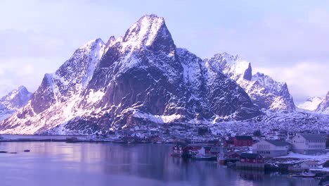Snow-covers-a-beautiful-view-of-a-harbor-and-bay-in-a-village-in-the-Arctic-Lofoten-Islands-Norway-1