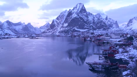 Snow-covers-a-beautiful-view-of-a-harbor-and-bay-in-a-village-in-the-Arctic-Lofoten-Islands-Norway-2
