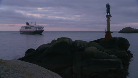 The-cruise-ship-Hurtigruten-sails-through-the-fjords-of-Norway-1