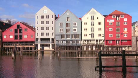Colorful-wooden-buildings-line-the-waterfront-of-Trondheim-Norway