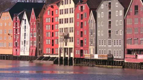 Colorful-wooden-buildings-line-the-waterfront-of-Trondheim-Norway-3