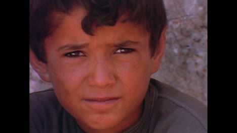 The-faces-of-young-niños-in-Syria-in-1996