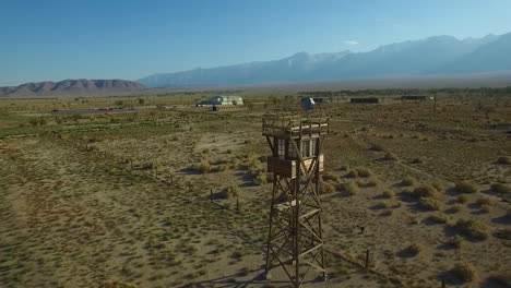 Stunning-aerial-over-the-Manzanar-Japanese-relocation-camp-ruins-in-the-Mojave-Desert-of-California