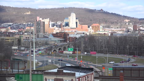 Establishing-shot-of-Reading-Pennsylvania-skyline-highways-and-downtown-buildings