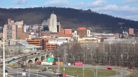 Establishing-shot-of-Reading-Pennsylvania-skyline-highways-and-downtown-buildings-1