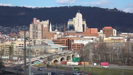 Establishing-shot-of-Reading-Pennsylvania-skyline-highways-and-downtown-buildings-2