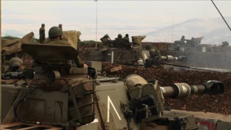 Israeli-soldiers-peer-out-of-a-tank-during-the-Israel--Lebanon-war