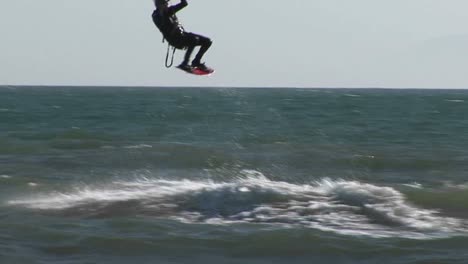 A-kitesurfer-catches-air-from-a-wave