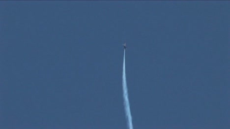 A-Blue-Angels-jet-barrel-rolls-straight-into-the-sky