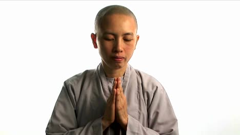 Ein-Junger-Buddhistischer-Mönch-Betet