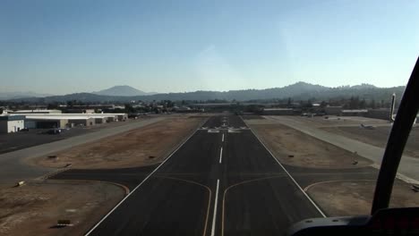 A-plane-heads-down-a-runway-and-takes-off