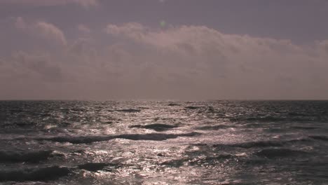 Choppy-waves-continuously-break-and-roll-onto-shore-