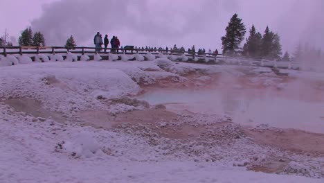 Tourist-gather-around-a-geothermal-area-in-Yellowstone-National-Park