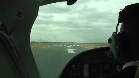 A-small-aircraft-takes-off-from-a-runway