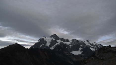 Winter-clouds-in-time-lapse-over-a-mountain-peak