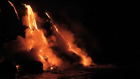 Spectacular-nighttime-lava-flow-from-a-volcano-into-ocean-1