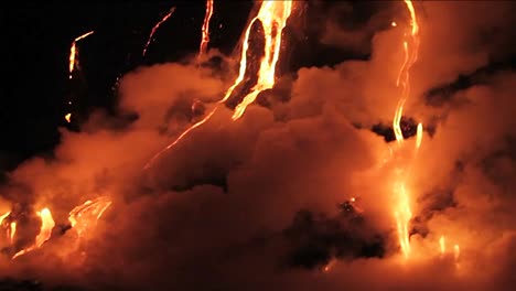 Spectacular-nighttime-lava-flow-from-a-volcano-into-ocean-3