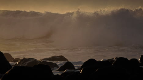 Beautiful-large-waves-break-against-a-rocky-shore-in-Hawaii