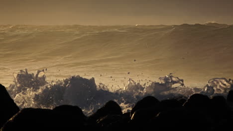 Waves-crash-against-a-rocky-shoreline