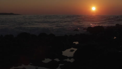 The-sun-sets-behind-beautiful-ocean-waves-2