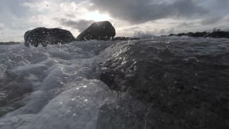 Water-level-view-of-waves-crashing-and-rolling-into-shore-in-slow-motion-1