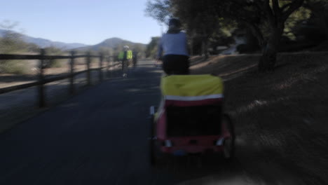 Point-of-view-time-lapse-of-a-women-riding-a-bike-towing-a-trailer-on-the-Ojai-to-Ventura-Bike-Trail-in-Ojai-California