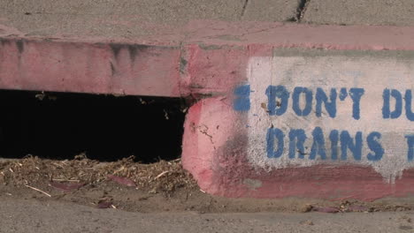 Pan-of-a-Don't-Dump-Drains-to-Creek-sign-in-Ojai-California