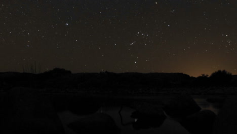 Time-lapse-of-the-moonrise-and-stars-setting-over-the-Ventura-River-in-Oak-View-California