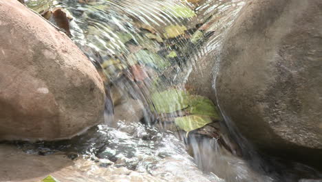 Close-up-zoom-out-on-a-waterfall-in-Wheeler-Springs-above-Ojai-California