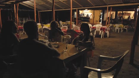 Time-lapse-of-people-dining-outdoors-at-La-Saladita-Beach-in-Guerrero-Mexico