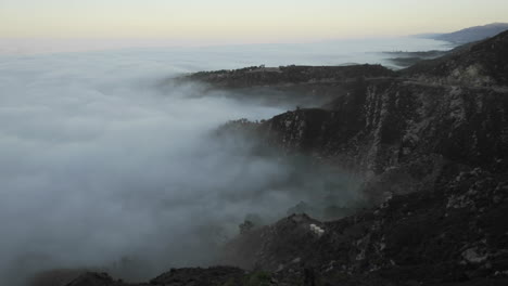 Slow-time-lapse-of-coastal-fog-at-sunrise-along-the-Santa-Ynez-Mountains-above-Montecito-California