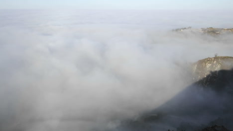 Closeup-time-lapse-of-coastal-fog-at-sunrise-along-the-Santa-Ynez-Mountains-above-Montecito-California