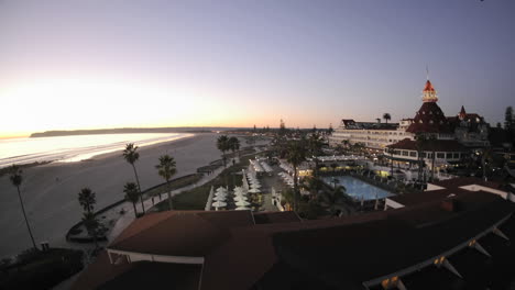 Day-to-night-time-lapse-of-the-sun-setting-and-lights-on-the-historic-Hotel-Del-Coronado-in-San-Diego-California