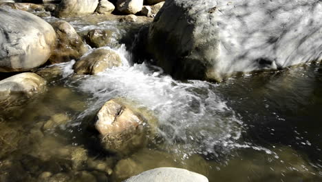 Panning-right-shot-of-clear-and-clean-waterfall--in-San-Antonio-Creek-in-Upper-Ojai-California