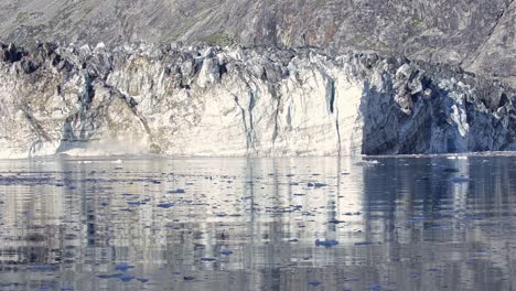Tidewater-glacier-Johns-Hopkins-glacier-calving-in-Glacier-Bay-National-Park-Alaska
