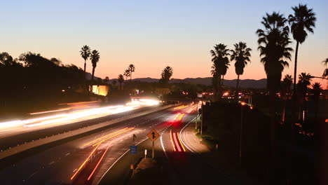 Time-lapse--cars-travel-on-a-freeway-at-sunset-or-dusk-5