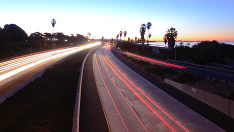 Time-lapse--cars-travel-on-a-freeway-at-sunset-or-dusk-6